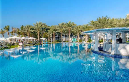 Бассейн Rixos The Palm Hotel & Suites